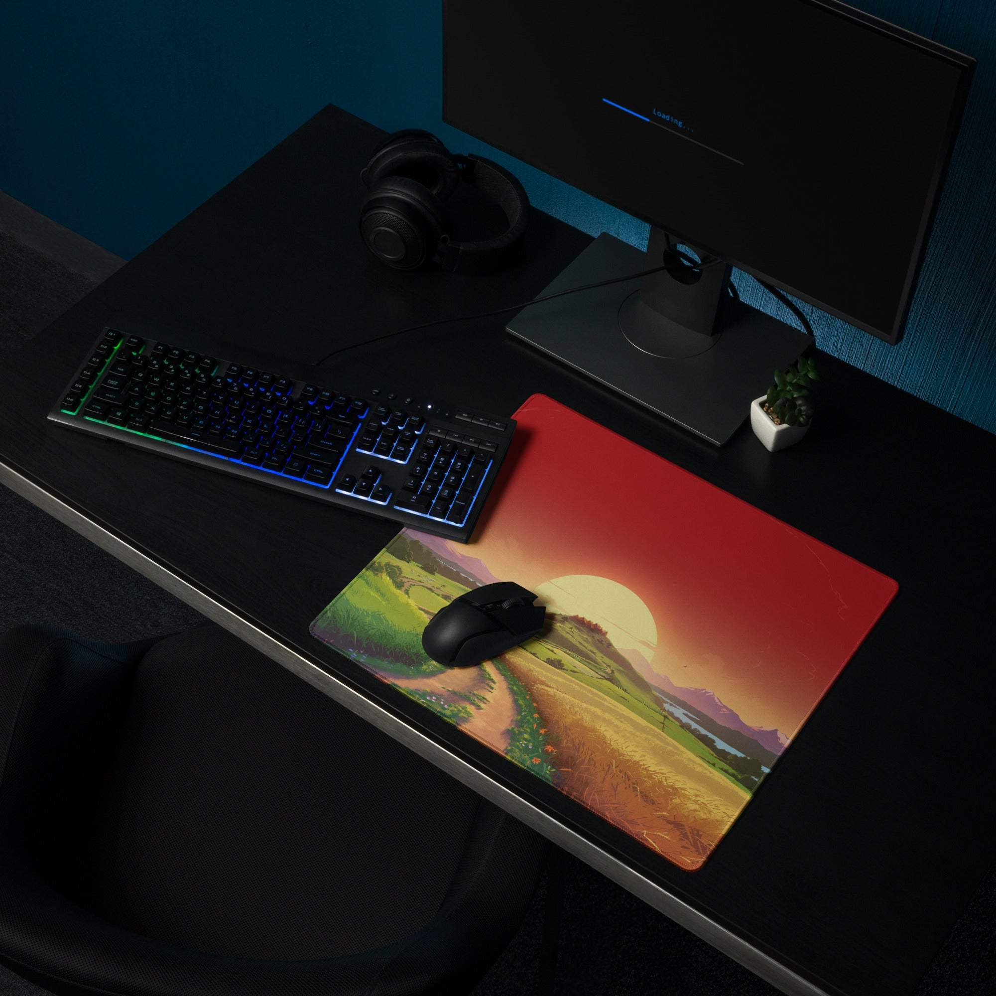 Vibrant red orange sunset gaming mousepad with hills path and black mouse