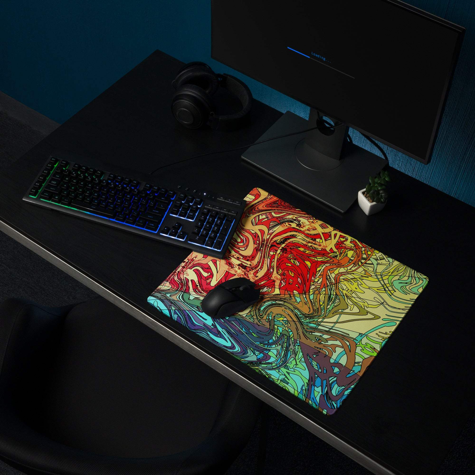 Vibrant abstract swirl gaming mouse pad in red yellow teal blue hues