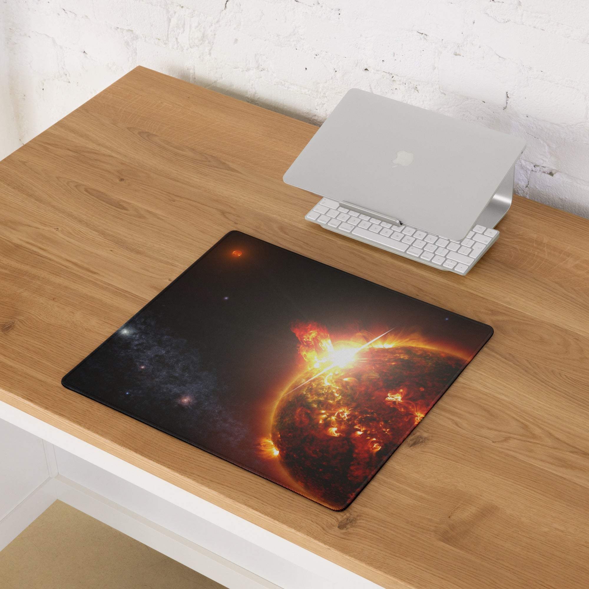 Cosmic solar flare gaming mouse pad with non-slip base and stitched edges