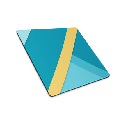 Geometric teal gold Google Play icon on vibrant gaming mouse pad