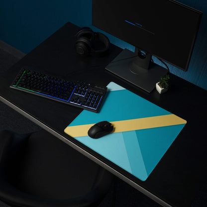 Geometric teal and yellow gaming mouse pad with non-slip base and stitched edges