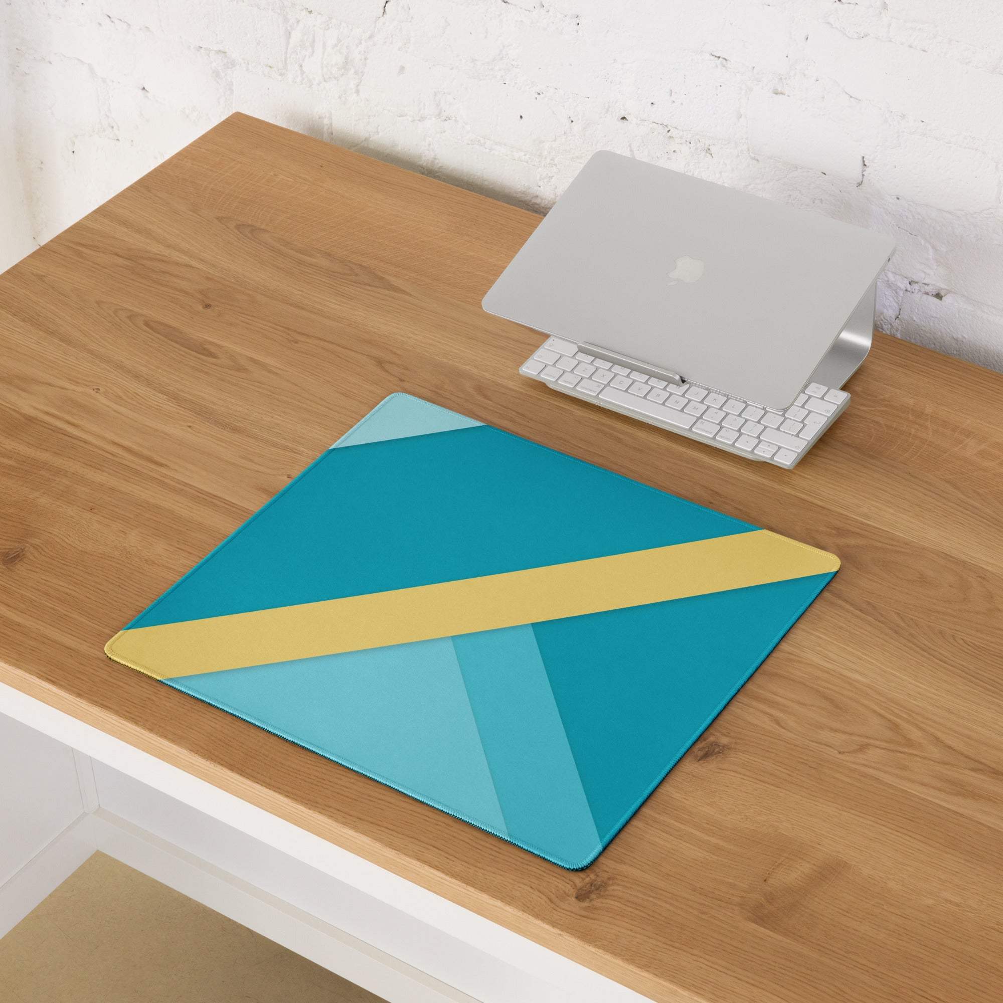 Geometric teal and gold gaming mouse pad with non-slip base