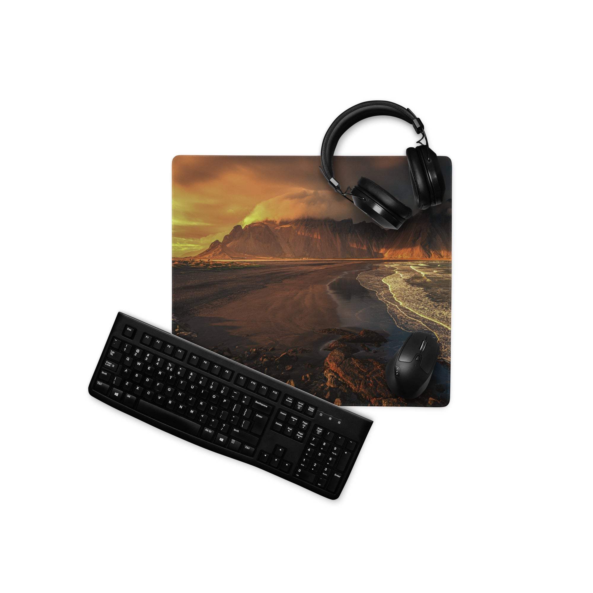 Black matte finish keyboard on Epic Mountain Coastline Sunset gaming mouse pad
