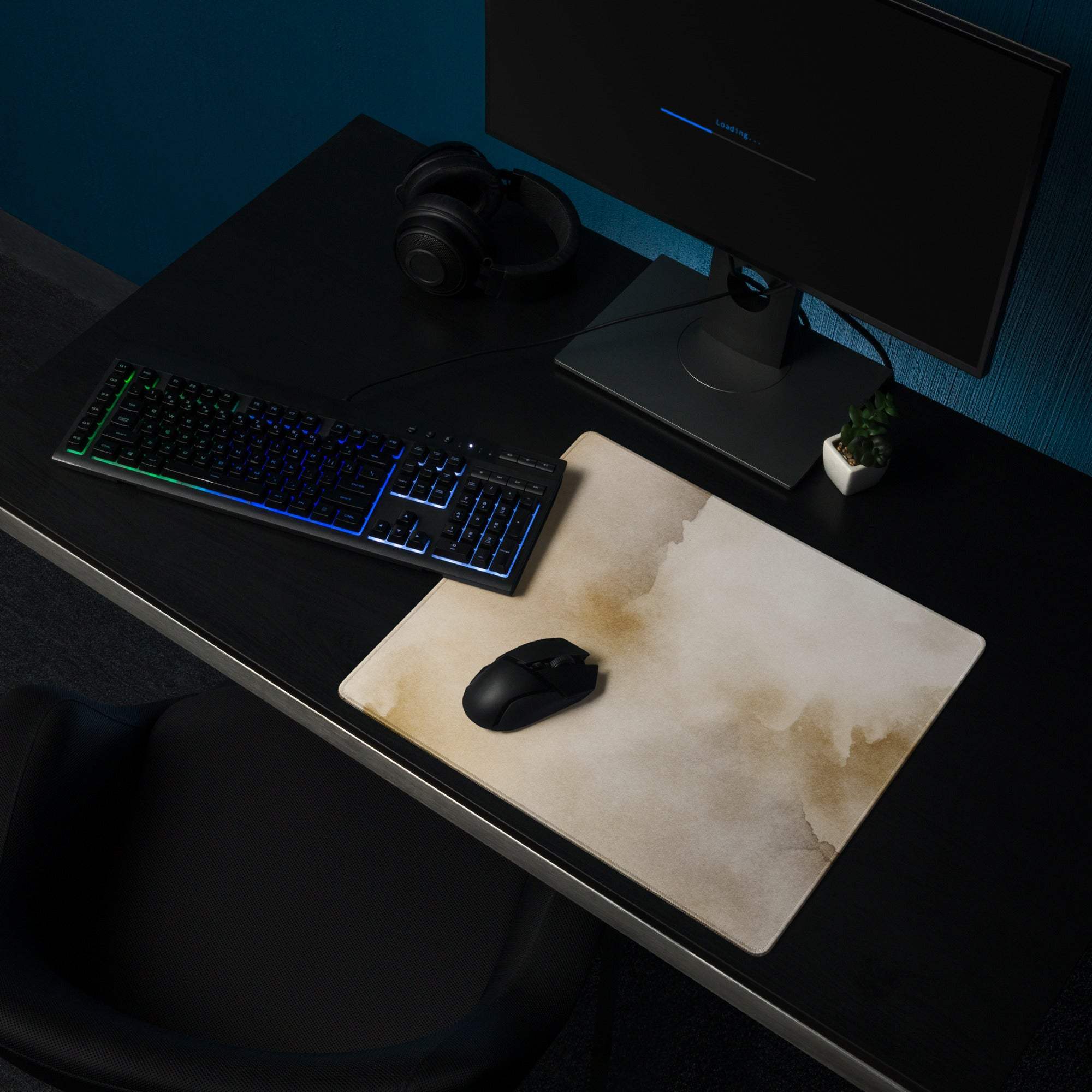 Beige watercolor gaming mouse pad with matte finish and non-slip base
