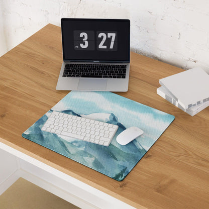 Blue watercolor mountain range gaming mouse pad with stitching and non-slip base