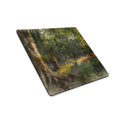 Square forest coaster on artistic green-toned gaming mouse pad