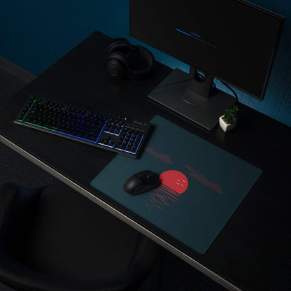 Teal gaming mousepad with red sun, pink dotted rays on dark navy, non-slip base