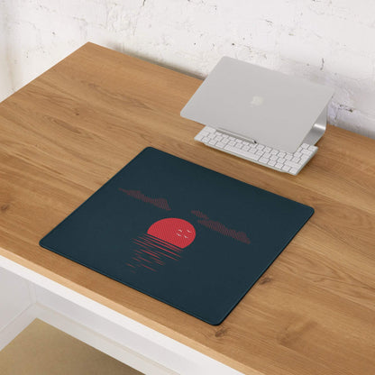Dark navy gaming mouse pad with red smiling sun and pink clouds