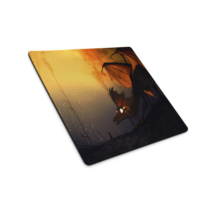 Stylized dragon sunset gaming mouse pad with glowing eyes and non-slip base