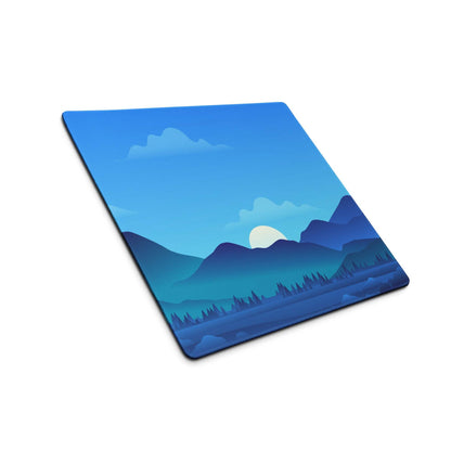 Vibrant blue mountain landscape gaming mousepad with gradient sky and trees