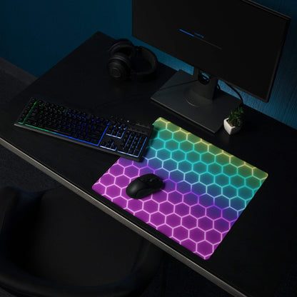 Vibrant rainbow hexagon RGB gaming mouse pad with non-slip base
