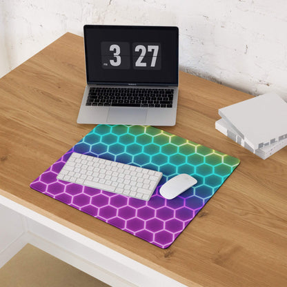 Vibrant RGB rainbow hexagon gaming mouse pad with purple-teal-green gradients