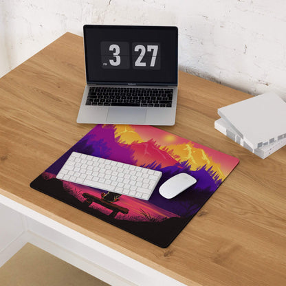 Vibrant purple orange sunset mountain mousepad with campfire bench silhouette