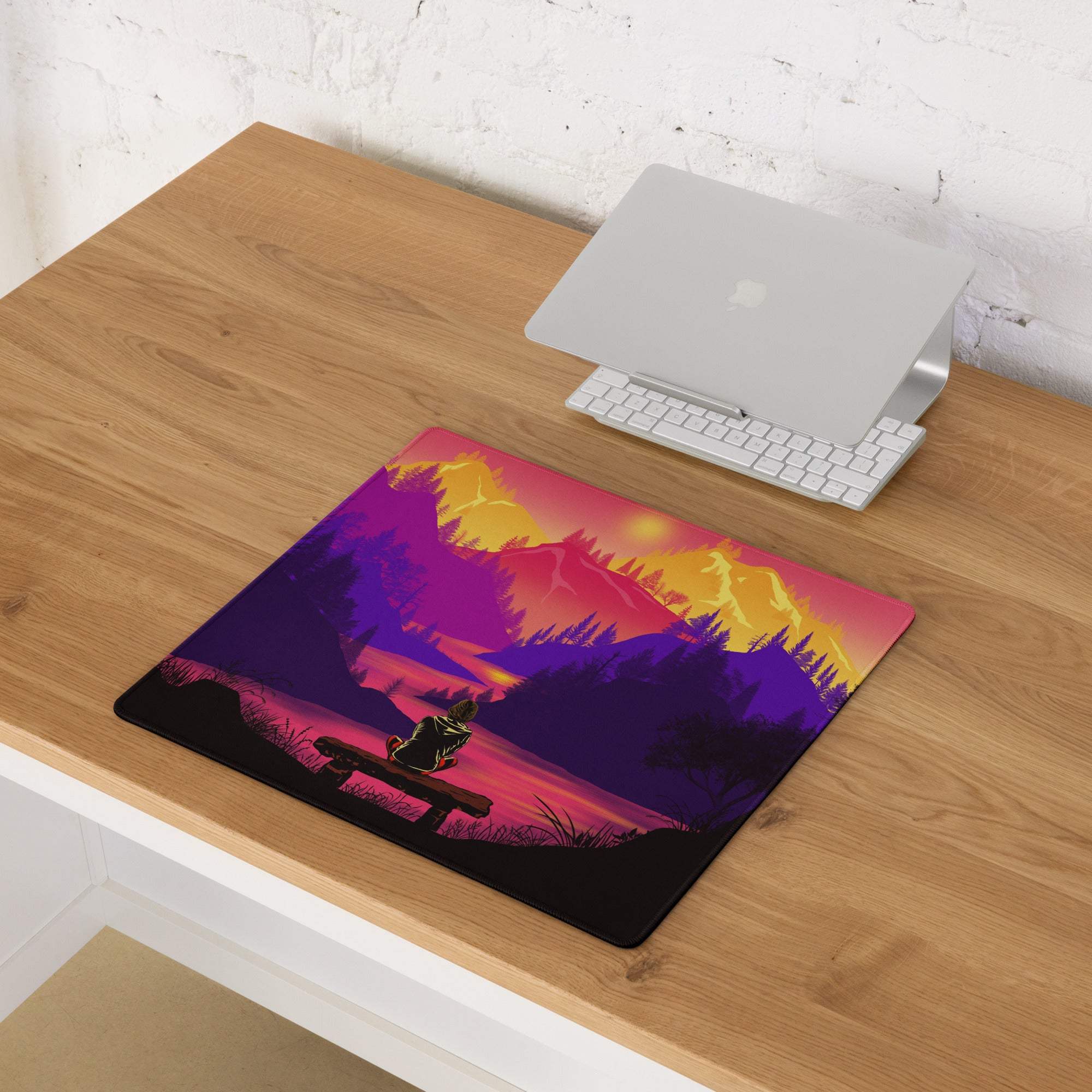 Stylized purple orange sunset mountain mousepad with bench silhouette