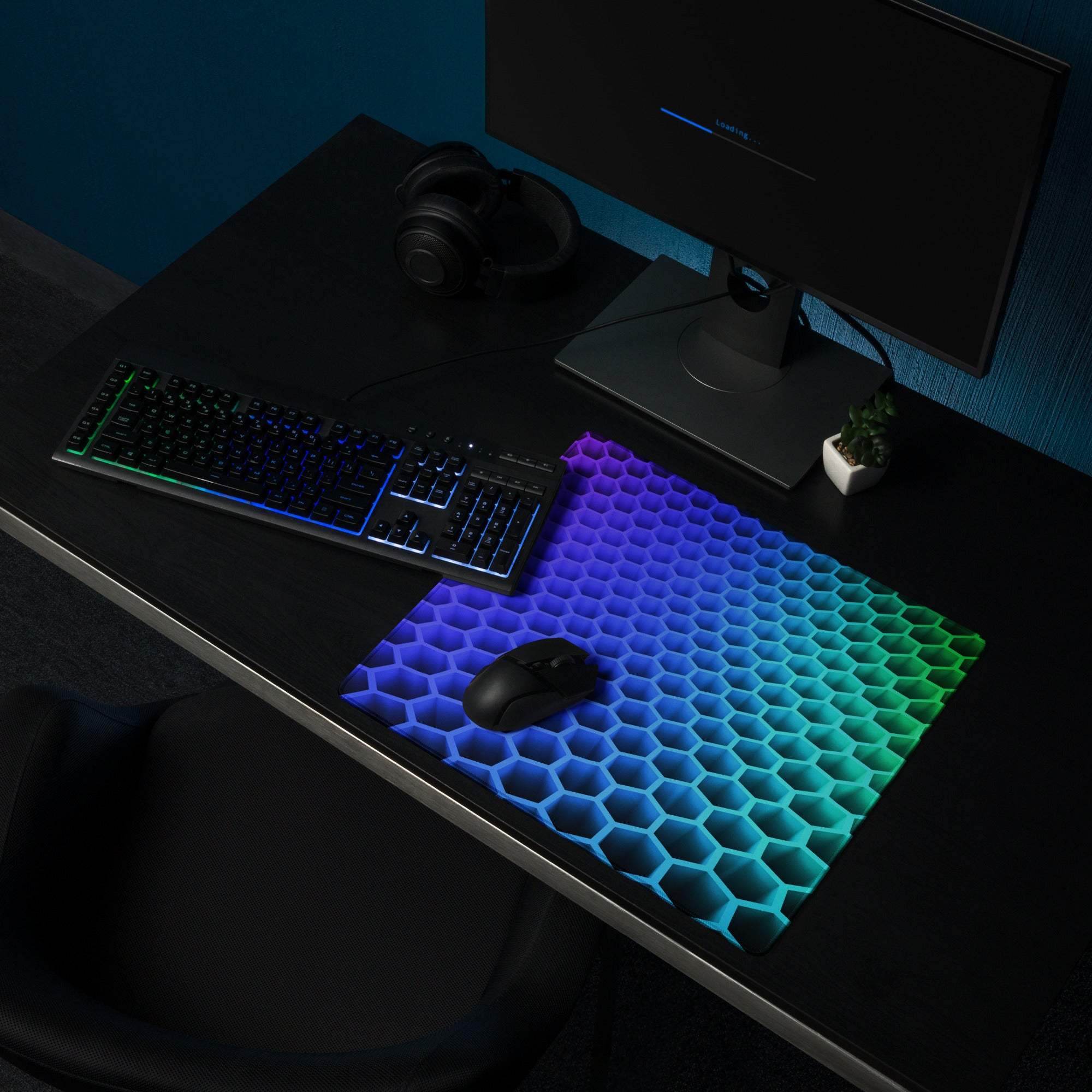 Vibrant rainbow gradient hexagon RGB gaming mouse pad with non-slip base