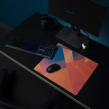 Vibrant geometric abstract colorful gaming mouse pad with orange-pink-blue gradient, large non-slip surface