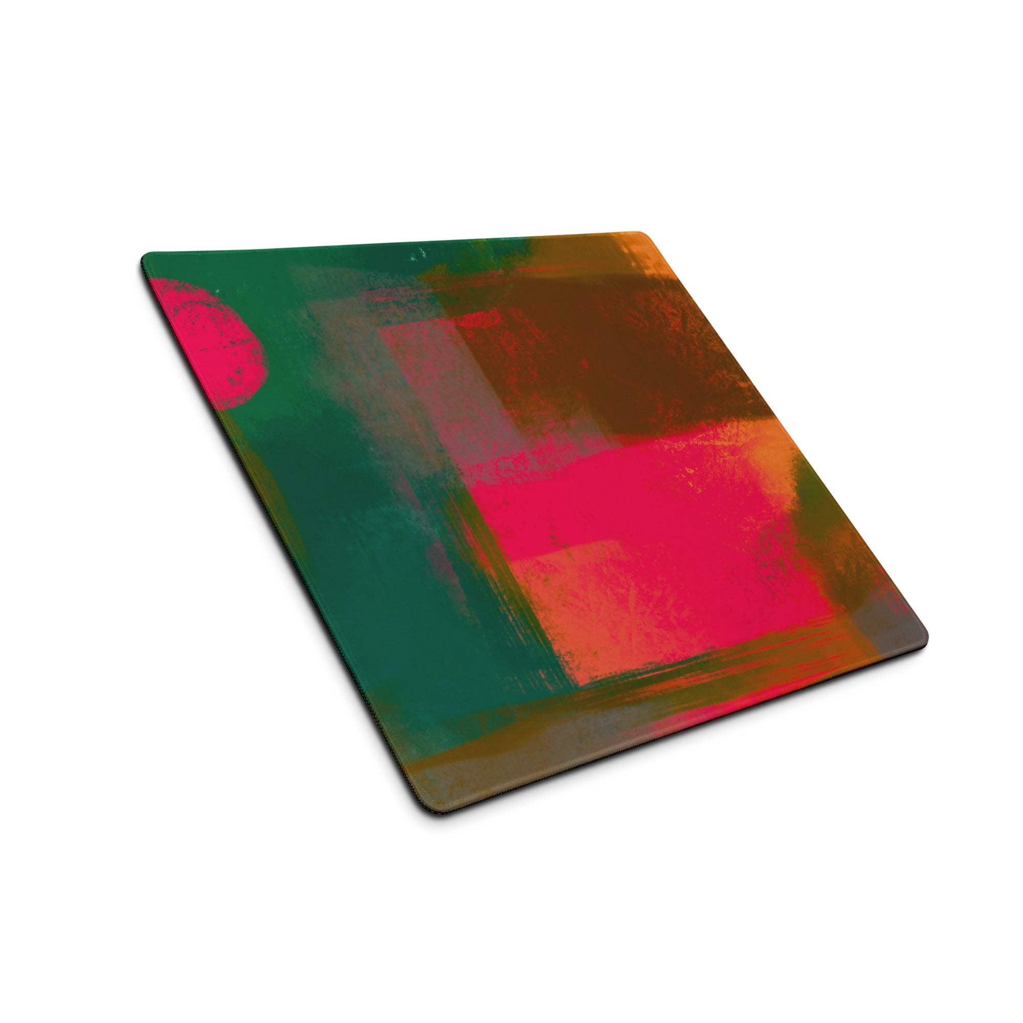 Vibrant abstract glass coaster with bold green red orange brushstrokes on large gaming mouse pad