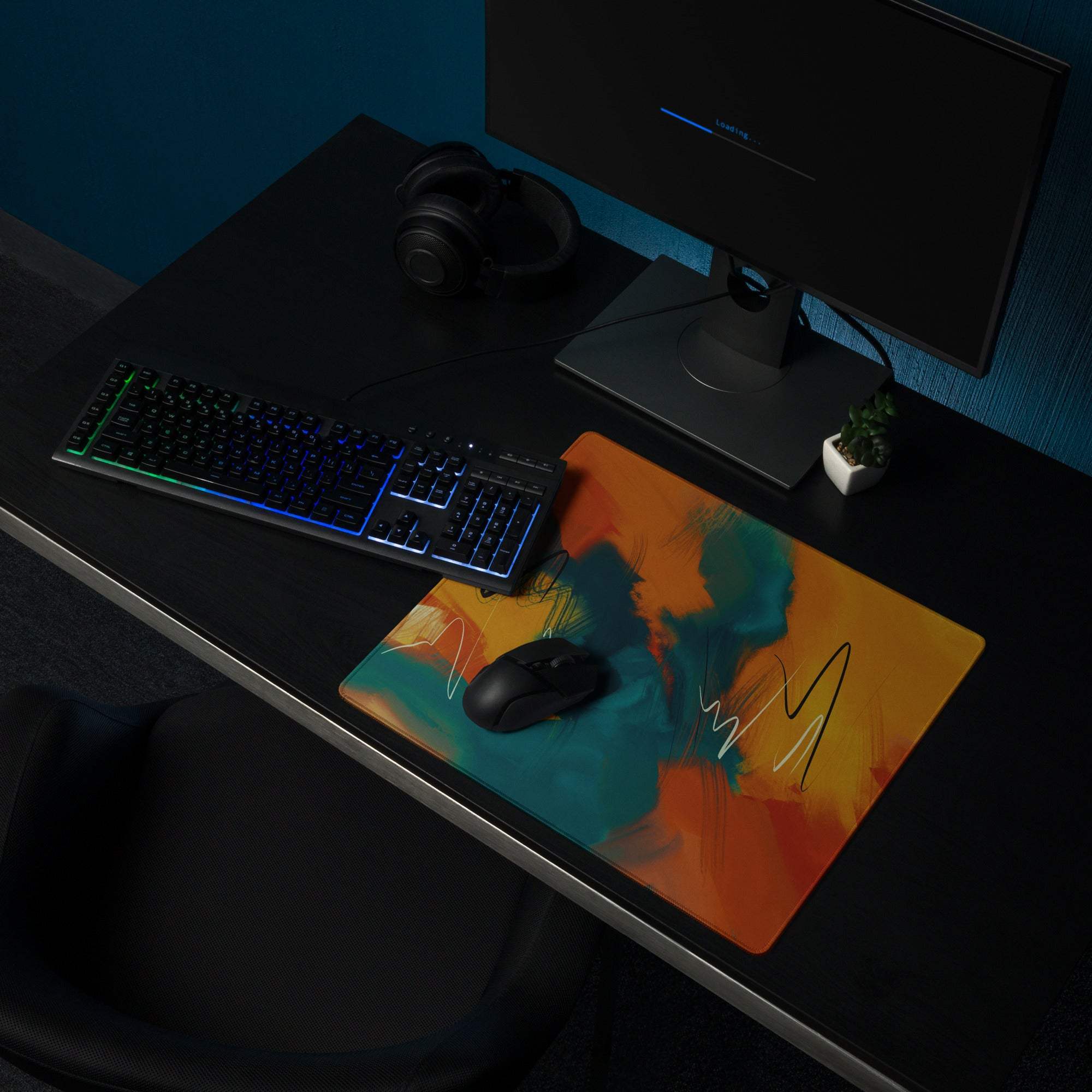 Vibrant abstract gaming mouse pad with orange teal yellow swirls large non-slip stitched