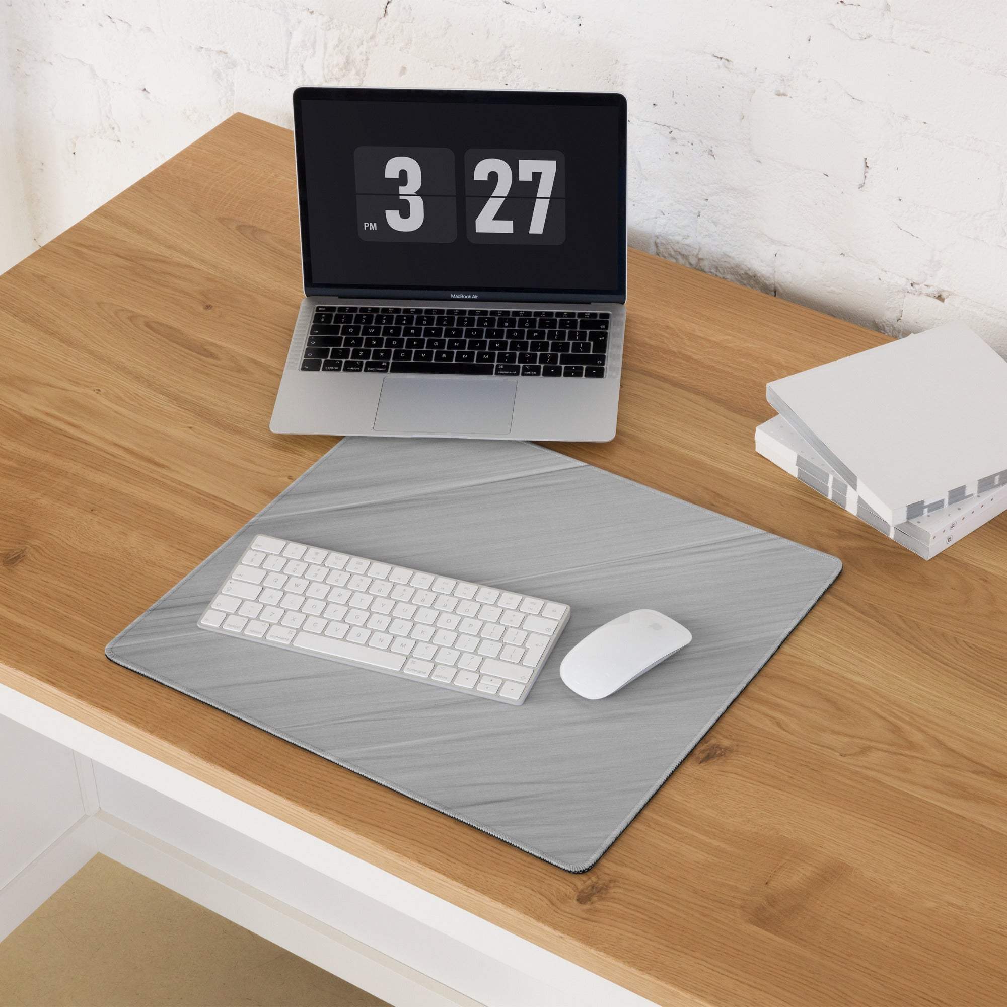 Gray textured large gaming mousepad with white keyboard and mouse