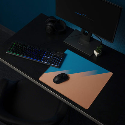 Blue and tan geometric gaming mousepad with black wireless mouse