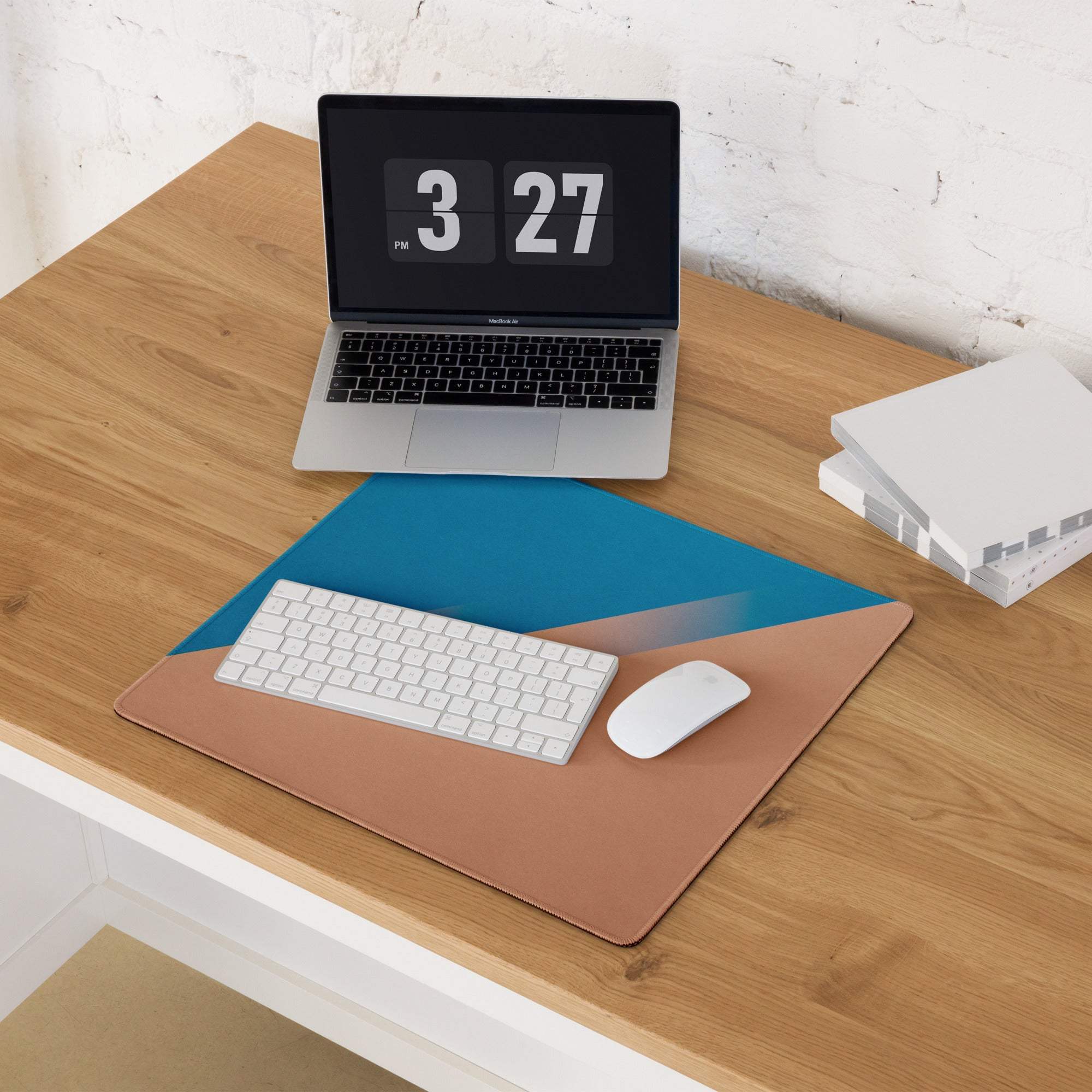 Tan leather desk mat with blue geometric accent on large gaming mouse pad