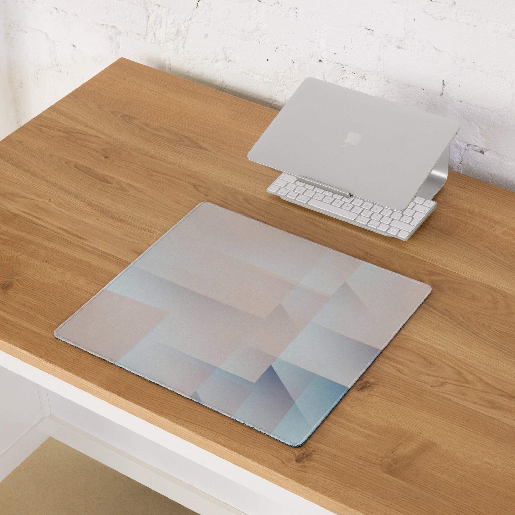 Pastel geometric gaming mouse pad with large surface, non-slip backing, edge stitching