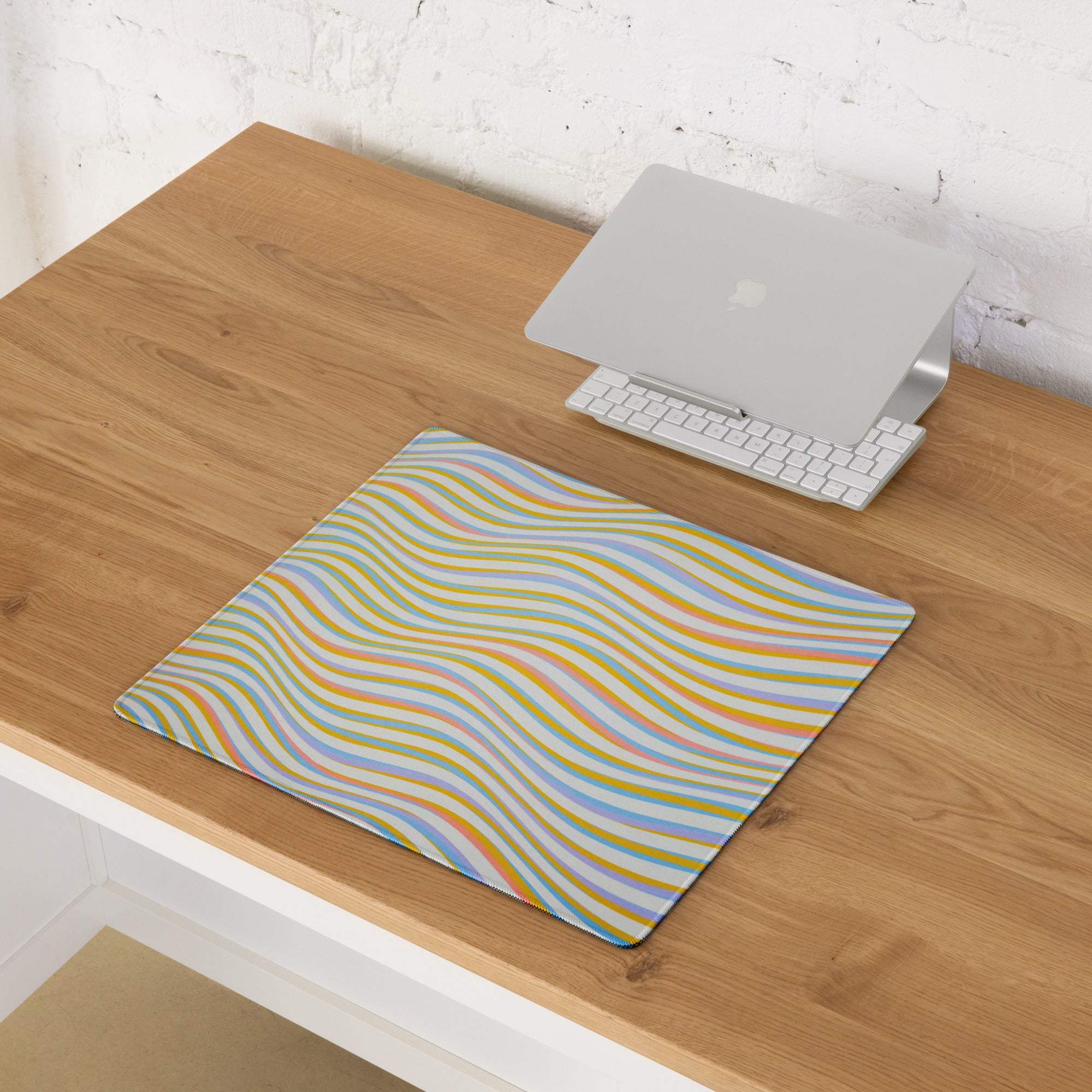 Vibrant multicolor wavy pastel stripe gaming mouse pad with non-slip base