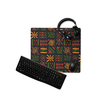 Black matte keyboard on diagonal left of Dota CSGO orange green gaming mouse pad