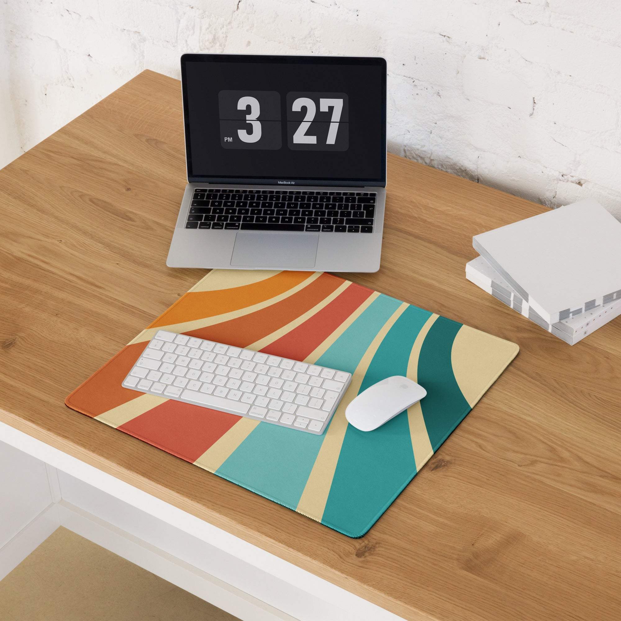 Vibrant retro gaming mouse pad with teal sunset stripes, non-slip edge stitching