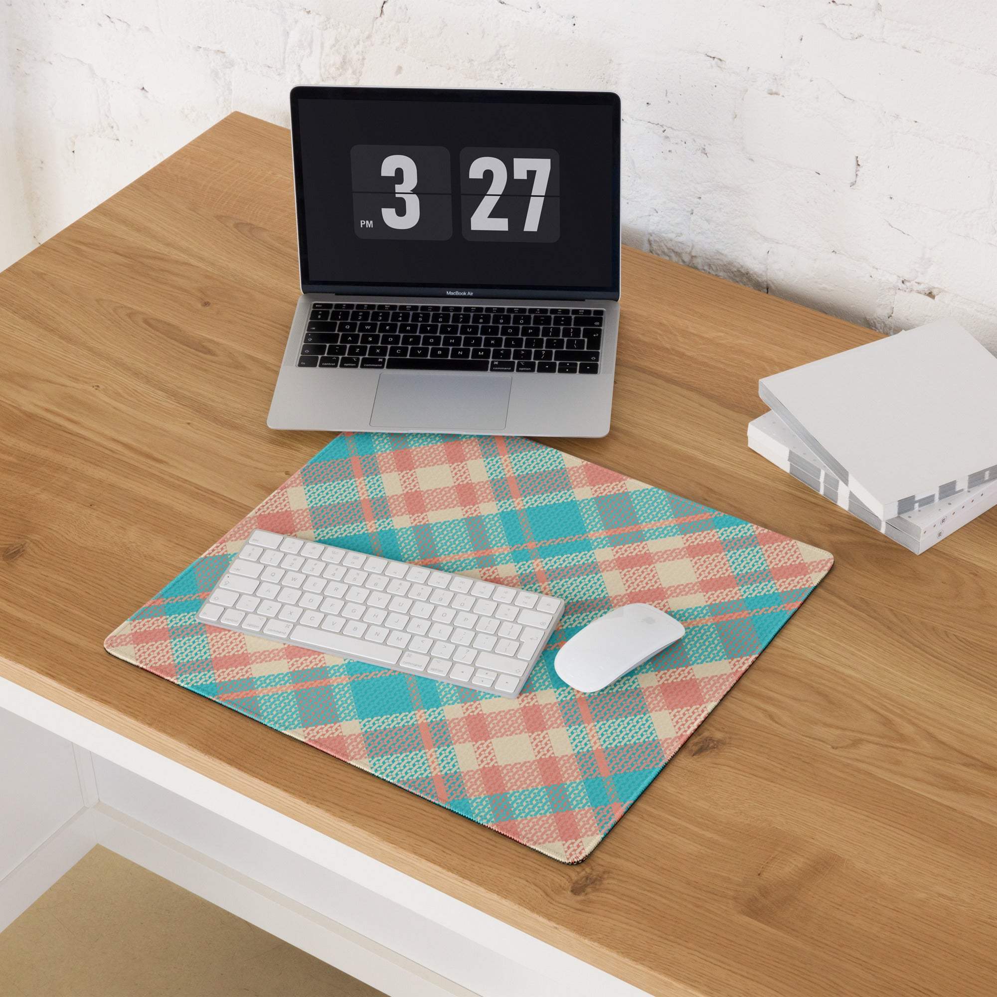 Vibrant teal peach plaid gaming mouse pad with non-slip base