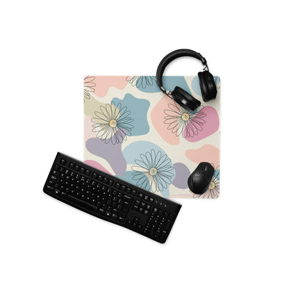 Pastel floral gaming mouse pad with outlined daisies in pink, blue, lavender on cream