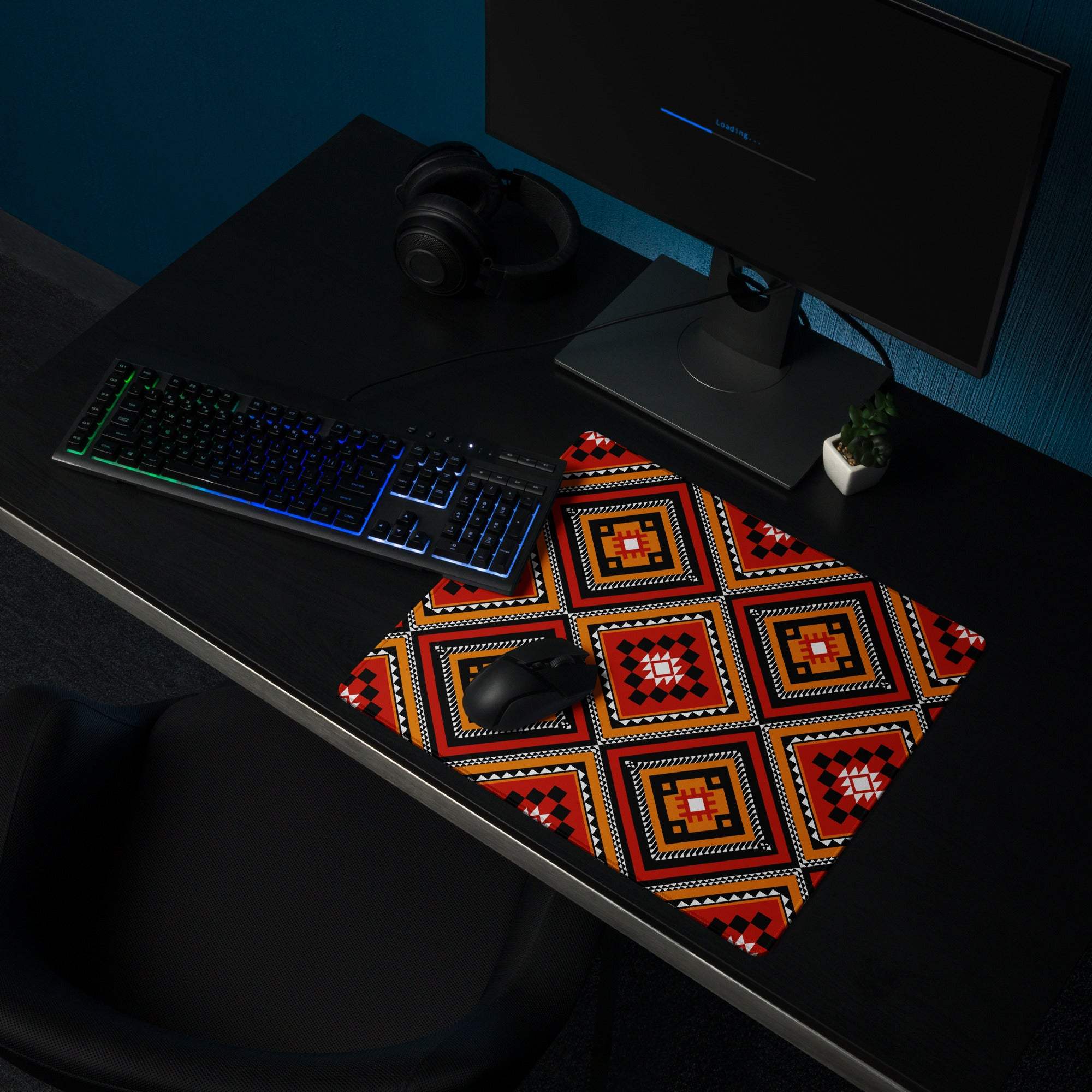 Vibrant tribal geometric diamond motif gaming mouse pad in red orange black white