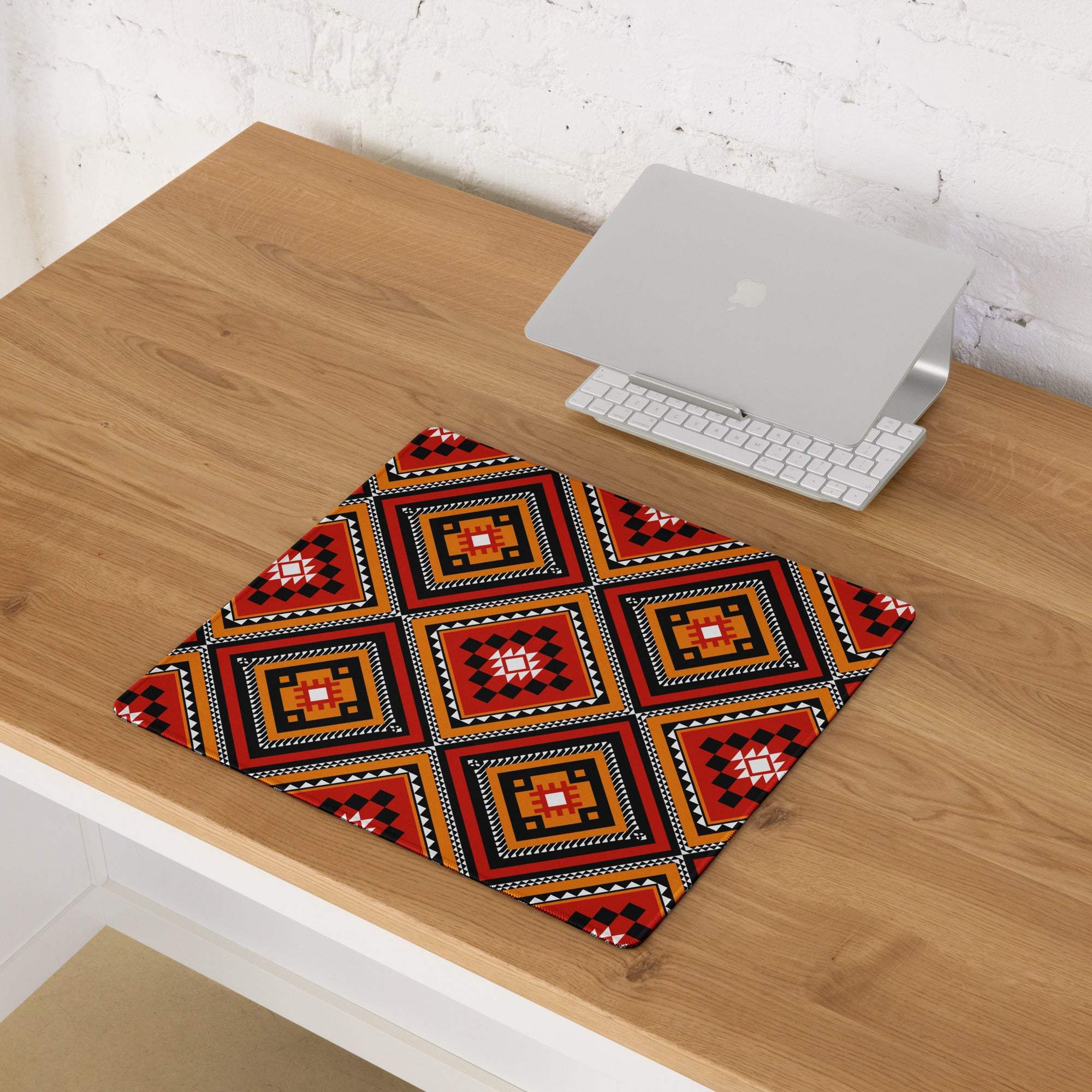 Vibrant tribal geometric diamond motif gaming mouse pad in red orange black white