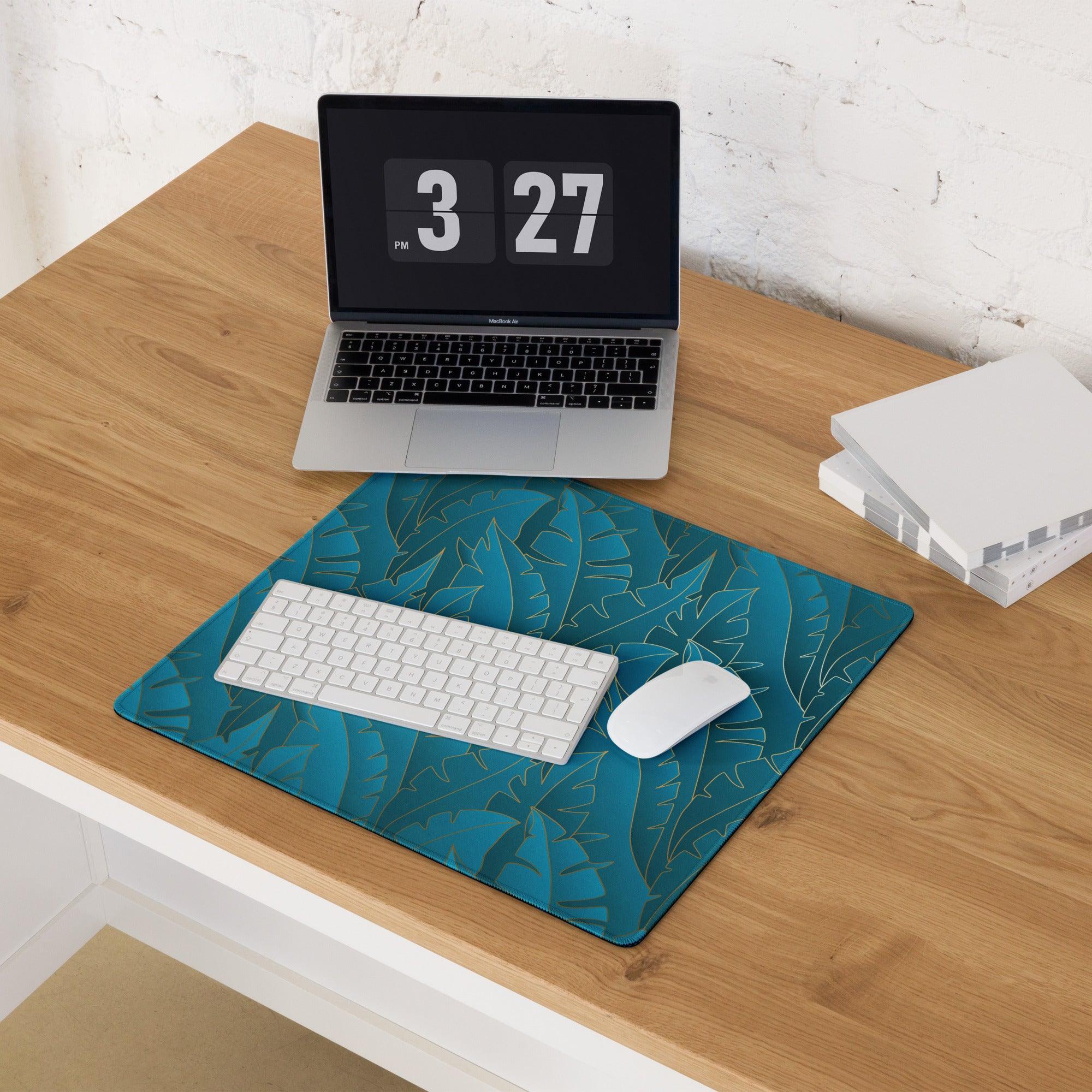 Teal tropical leaf pattern gaming mouse pad with non-slip base