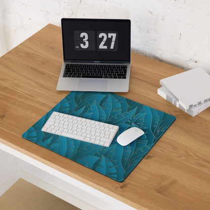 Teal tropical leaf pattern gaming mouse pad with non-slip base