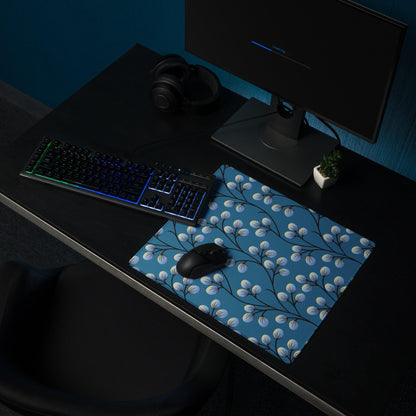 Elegant floral branches on deep blue gaming mouse pad for precision glide