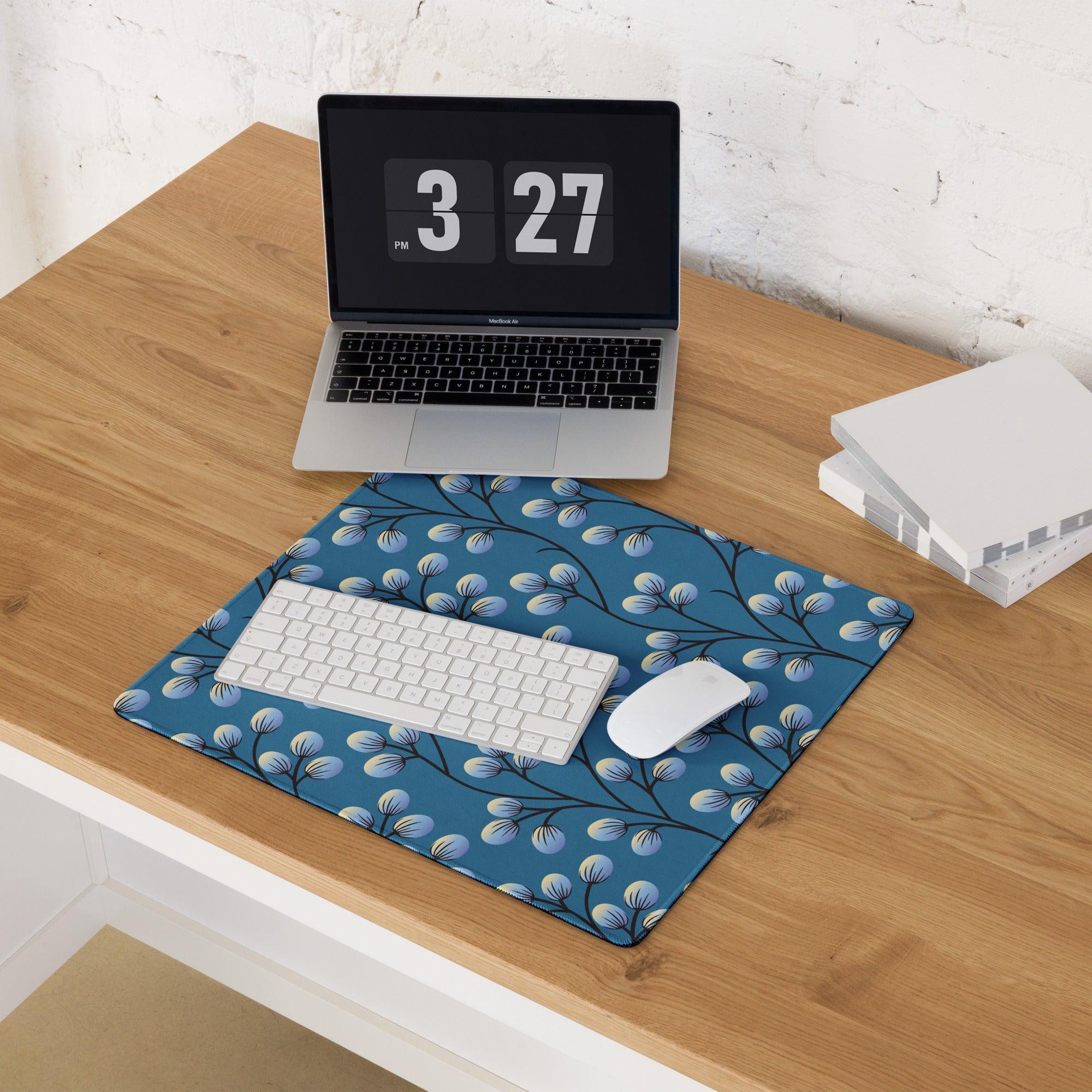 Blue floral gaming mousepad with white keyboard and mouse for precision glide