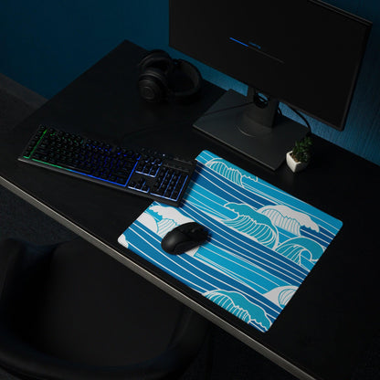 Blue wave-patterned gaming mouse pad with white teal accents non-slip surface