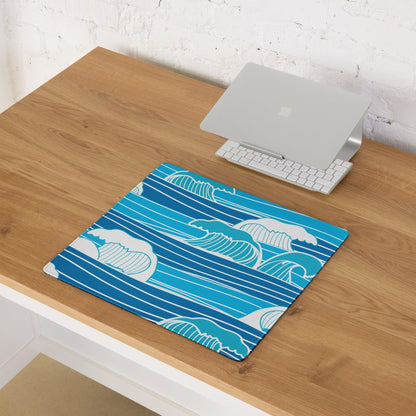 Blue ocean wave gaming mouse pad with teal accents, non-slip stitched surface
