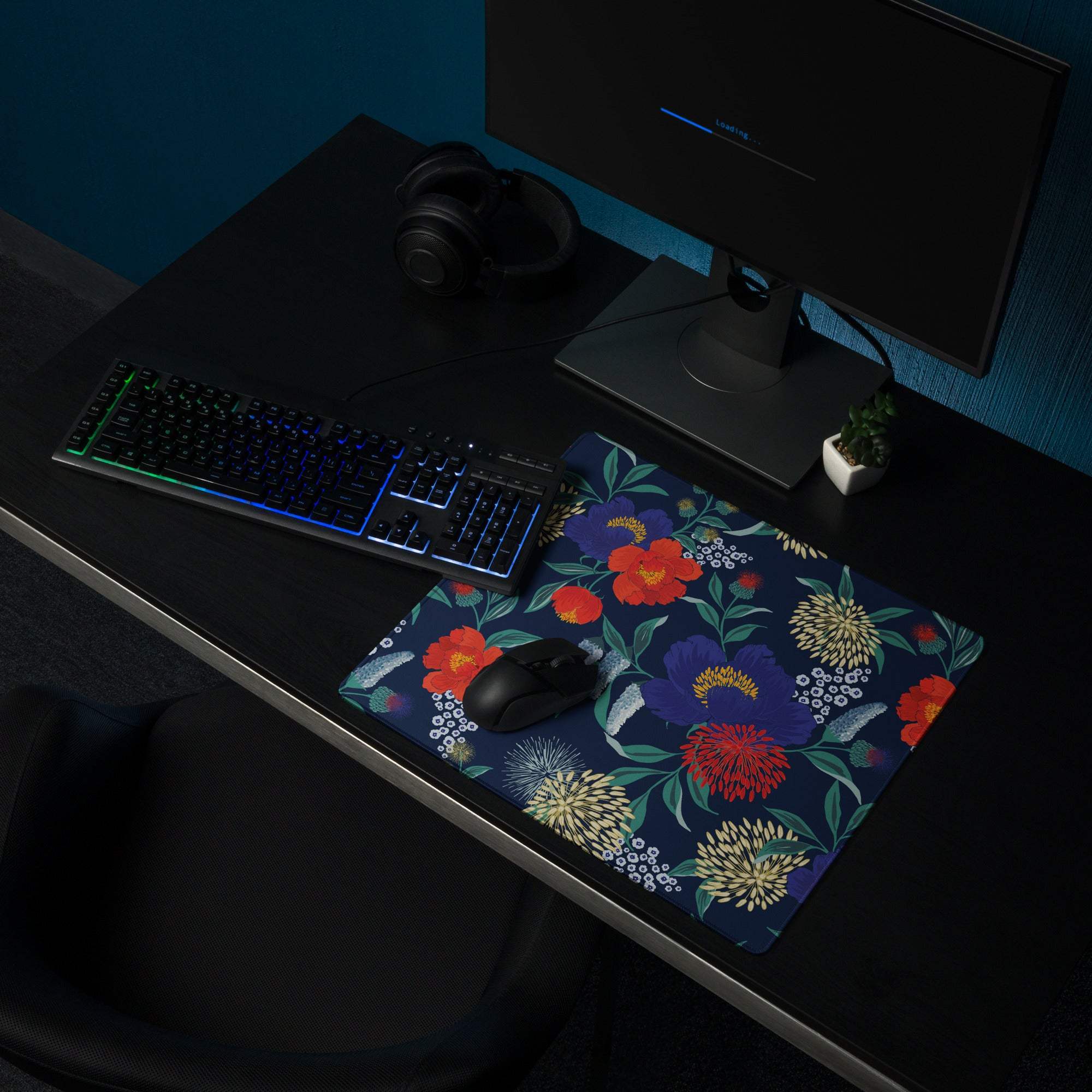 Floral navy blue gaming mouse pad with vibrant red purple blossoms and non-slip base