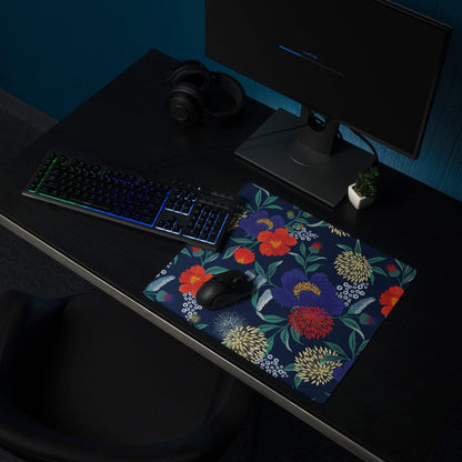 Floral navy blue gaming mouse pad with vibrant red purple blossoms and non-slip base