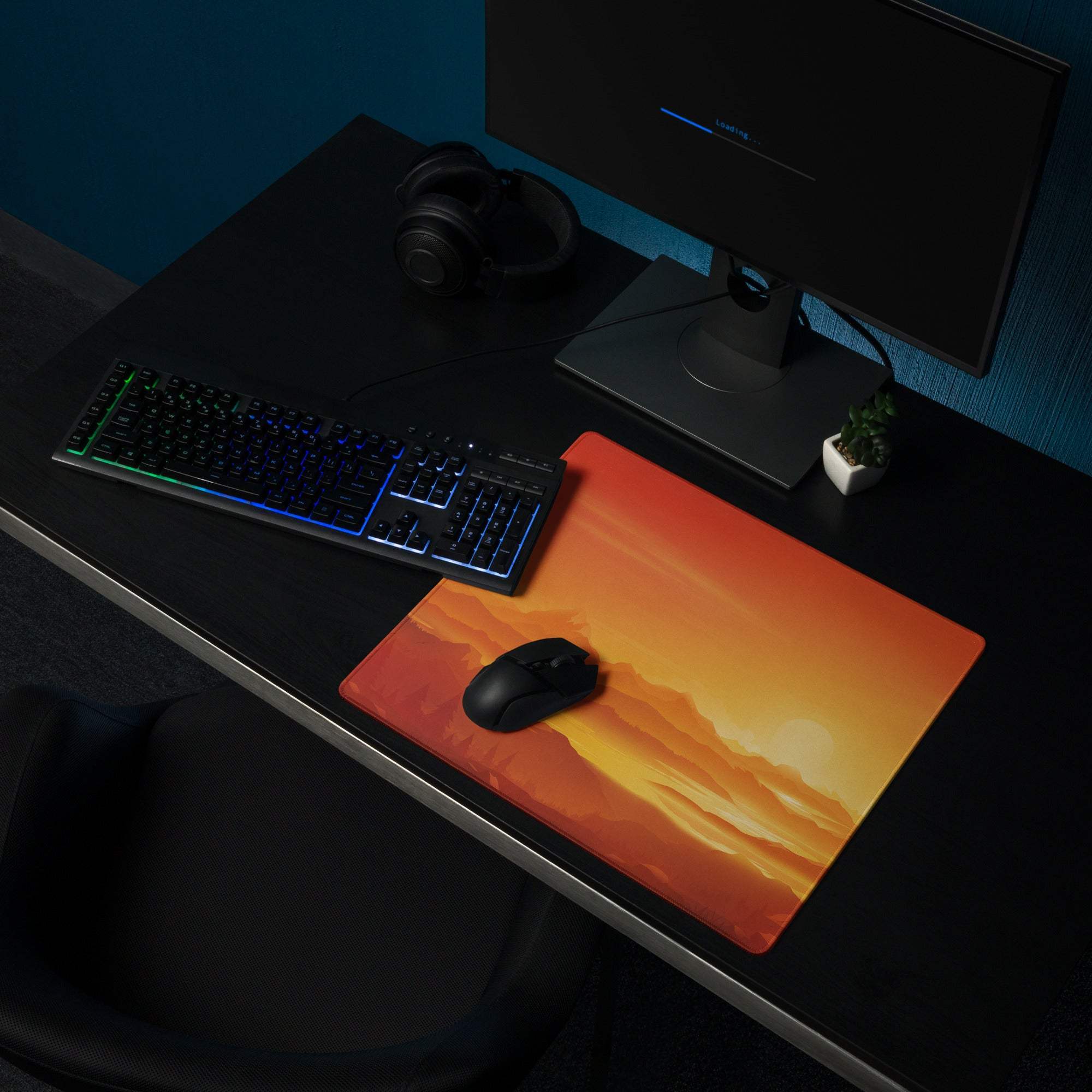 Sunset orange mountain gaming mousepad with black wireless mouse