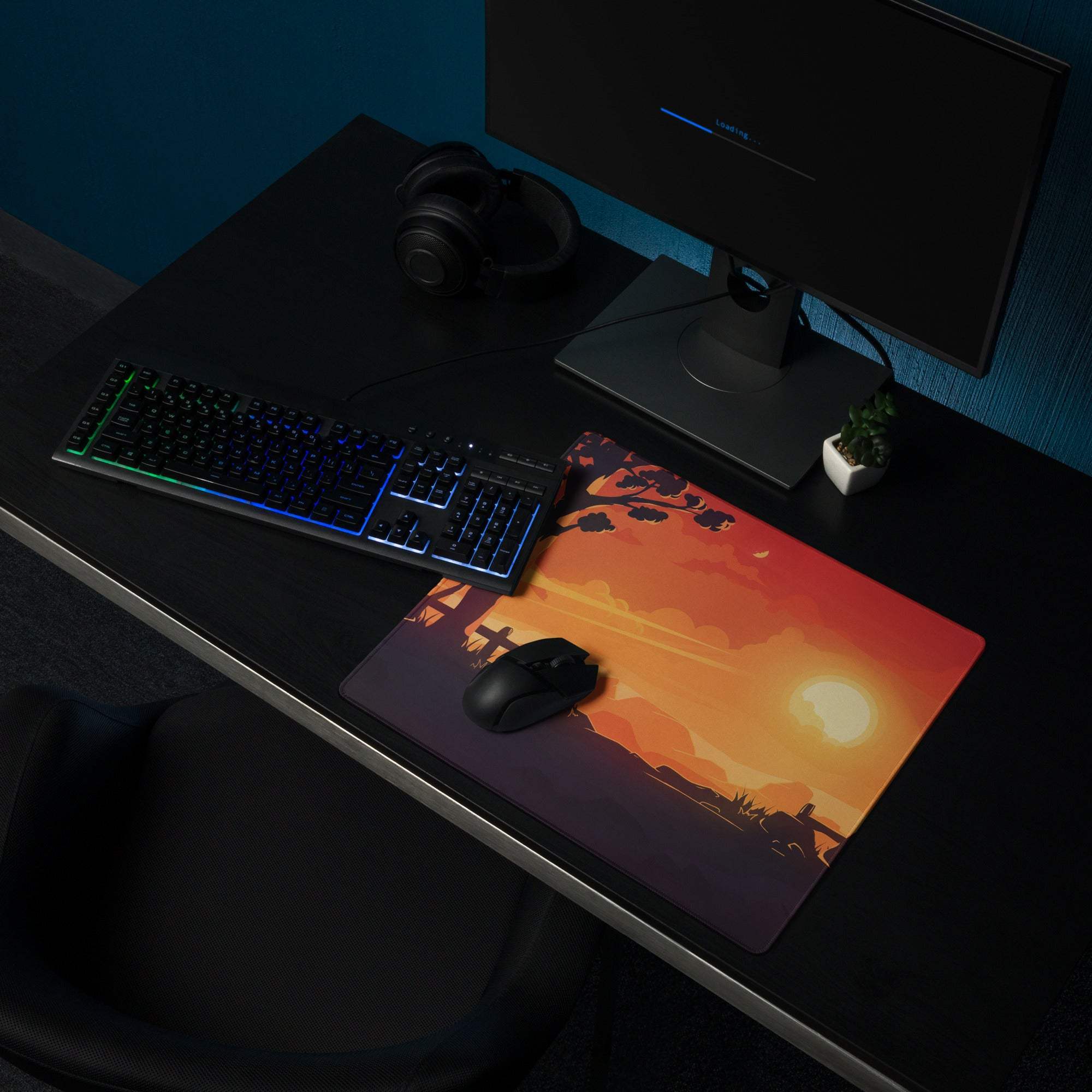 Vibrant sunset gaming mousepad with orange-purple gradient, trees, large non-slip stitching