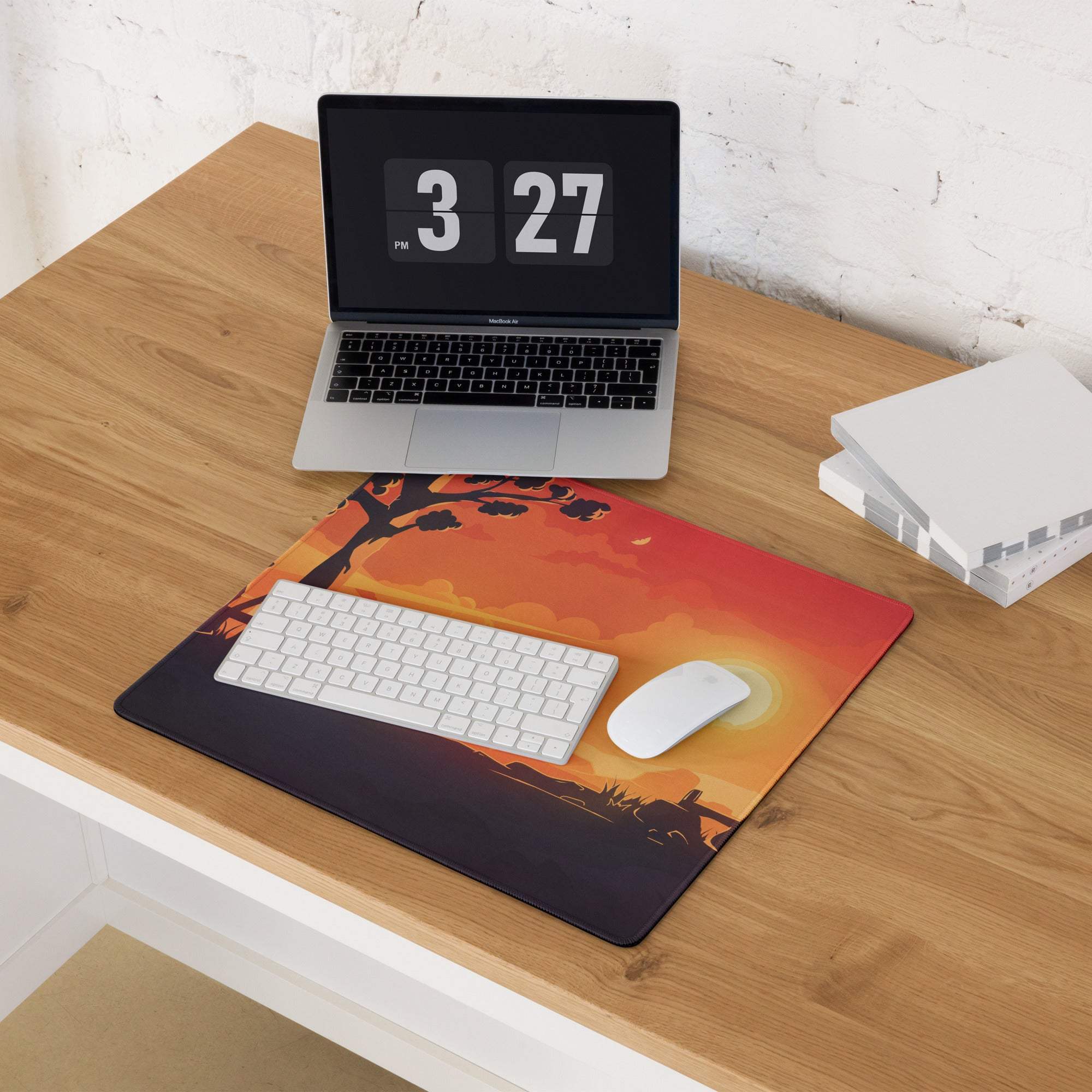 Stylized sunset gaming mouse pad with large size, non-slip edges, vibrant orange hues