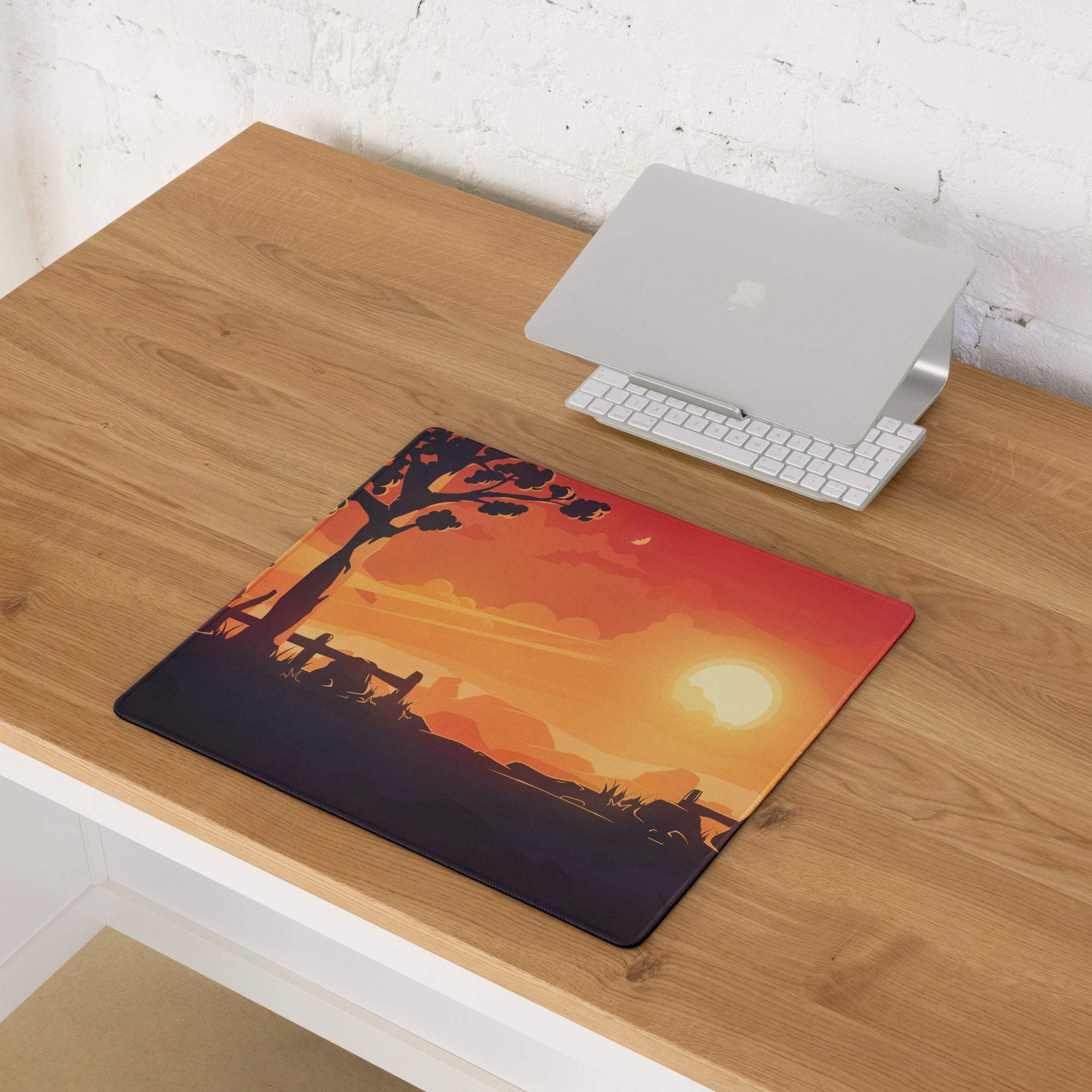 Stylized sunset gaming mouse pad with orange hues, trees, large size, non-slip edges