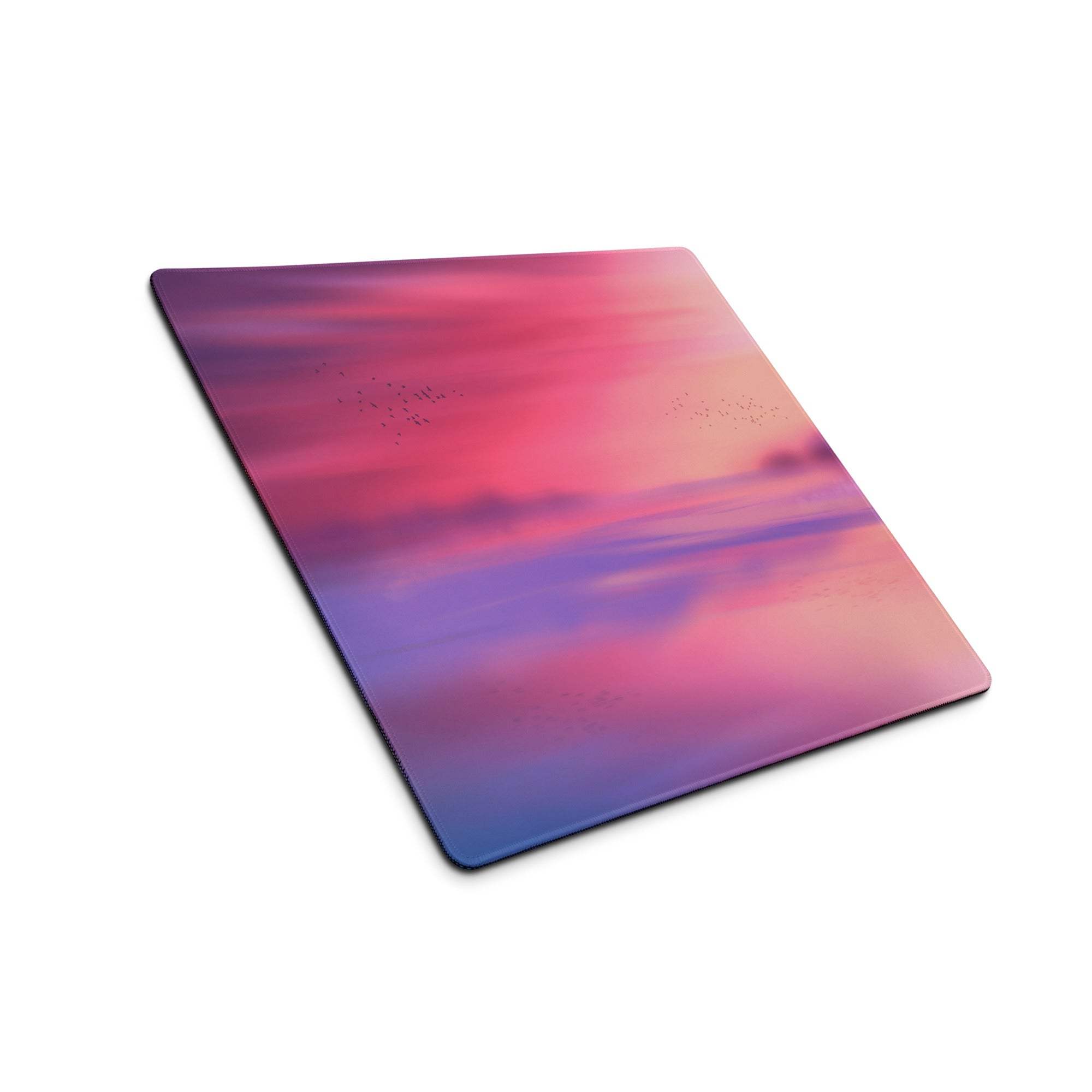 Large pastel sunset gradient gaming mouse pad with pink purple blue hues and non-slip stitched edges