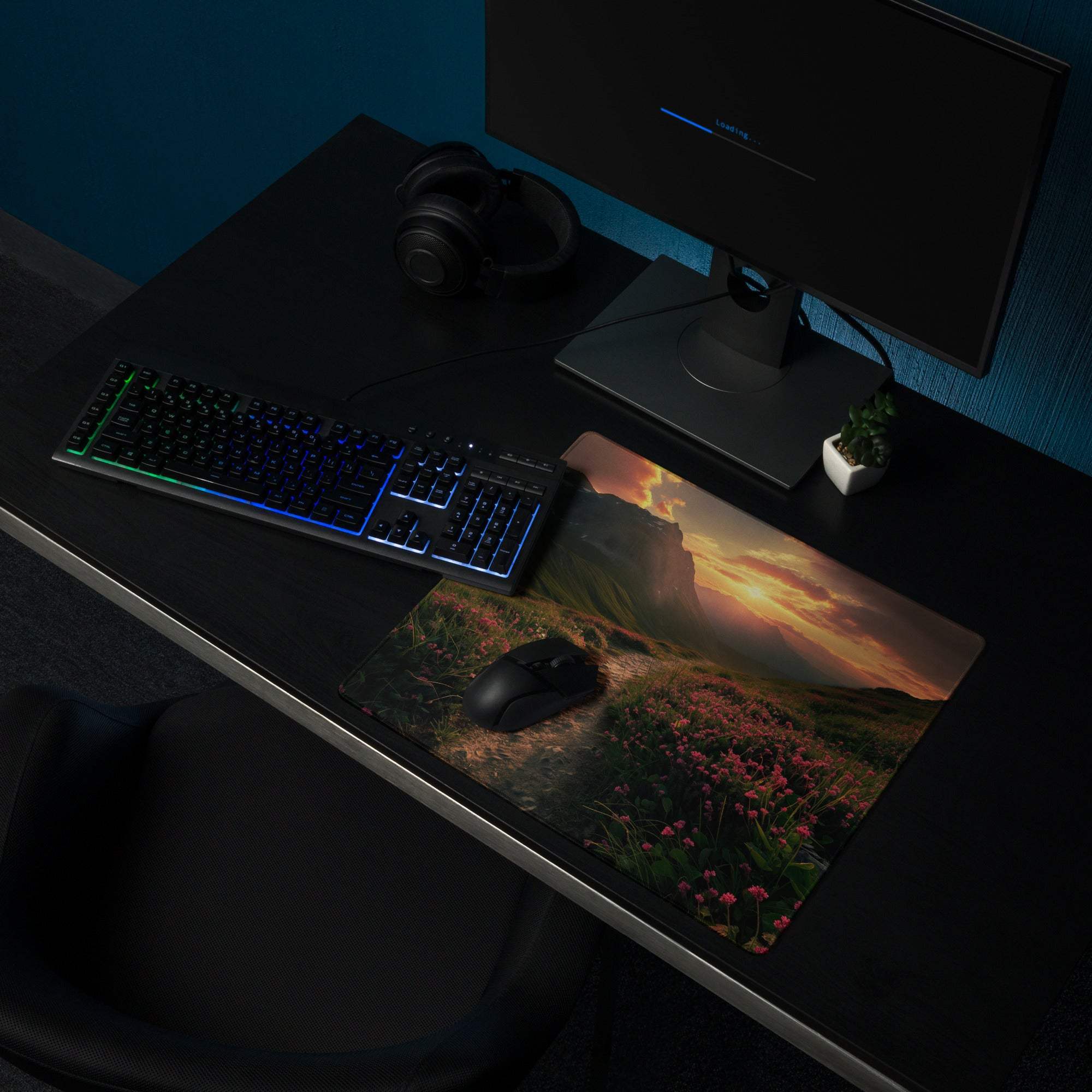 Epic sunset mountain landscape with pink flower field gaming mouse pad