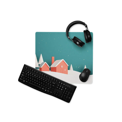 Teal winter village gaming mouse pad with snow-covered houses and trees