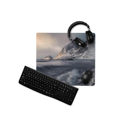 Black wireless mouse keyboard set on Arctic Snow Mountain gaming mousepad with headphones