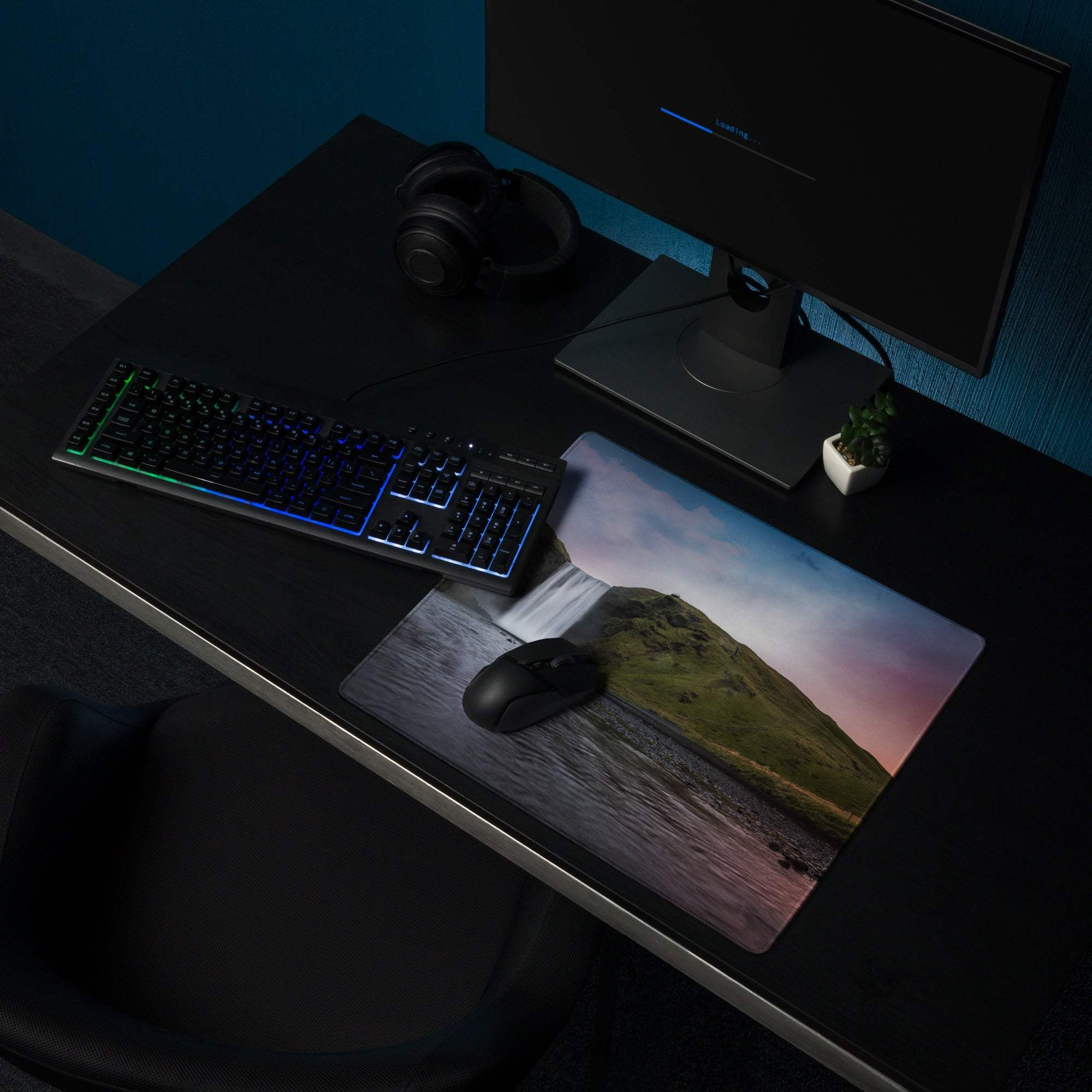 Premium large scenic sunset gaming mouse pad with green cliffside waterfall, non-slip backing, stitched edges